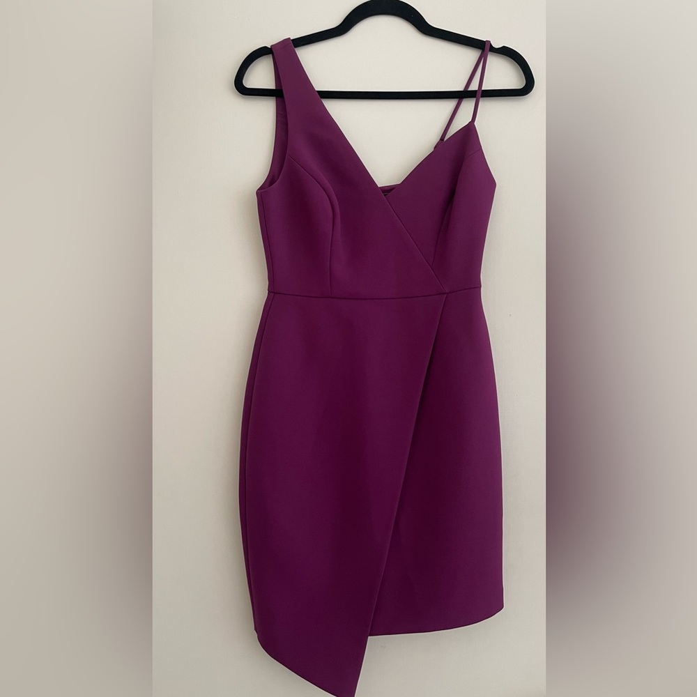 NWT asymmetrical BCBG mini dress. Size 0